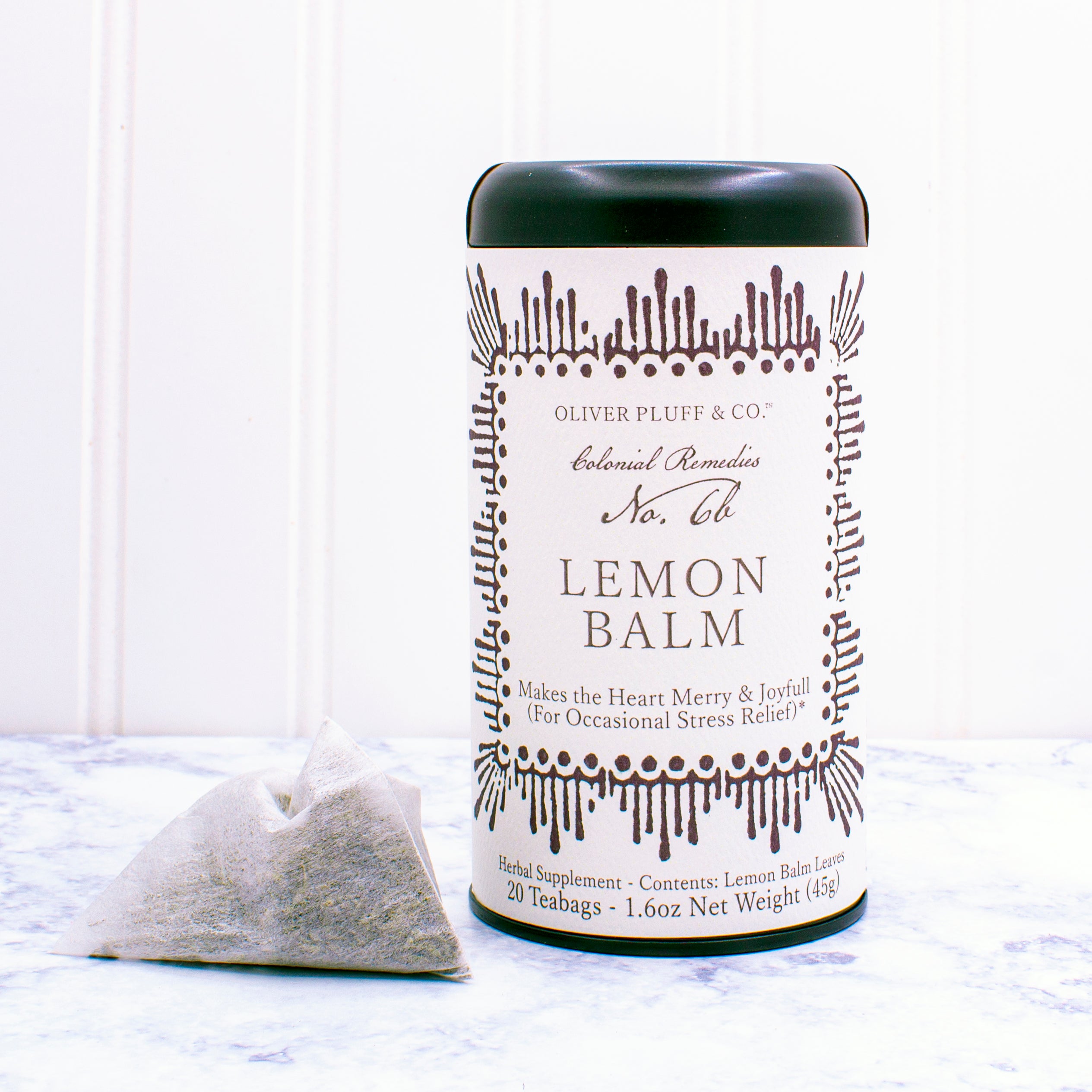 A box of Colonial Remedies No. 6b Lemon Balm tea featuring 20 teabags, with a refreshing lemon balm leaf design.