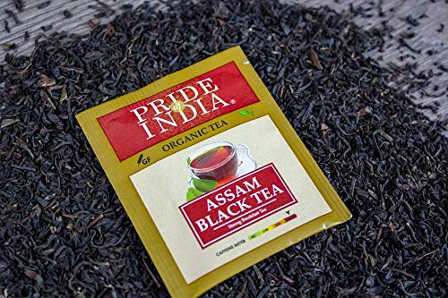 A pack of Organic Assam Breakfast Black Tea Bags, featuring 25 individually wrapped tea bags, showcasing the vibrant packaging and tea leaves.