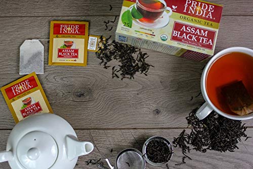 A pack of Organic Assam Breakfast Black Tea Bags, featuring 25 individually wrapped tea bags, showcasing the vibrant packaging and tea leaves.