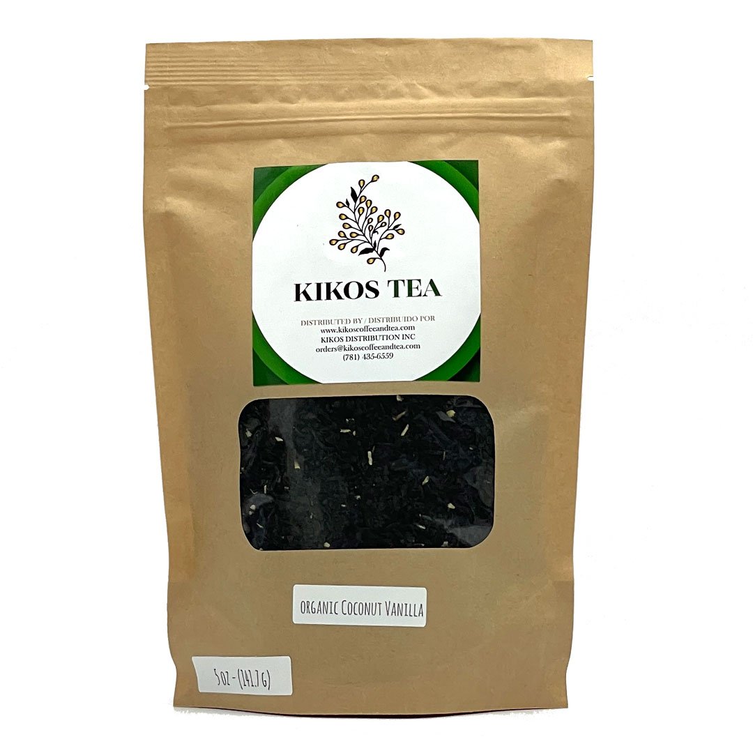 A vibrant package of Organic Black Coconut Vanilla Tea featuring black tea leaves, shredded coconut, and vanilla bits, perfect for a refreshing beverage.