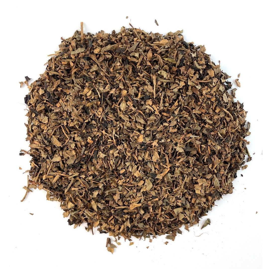 A package of Organic Decaf Black Tea featuring loose leaf tea leaves, ideal for brewing a soothing cup without caffeine.