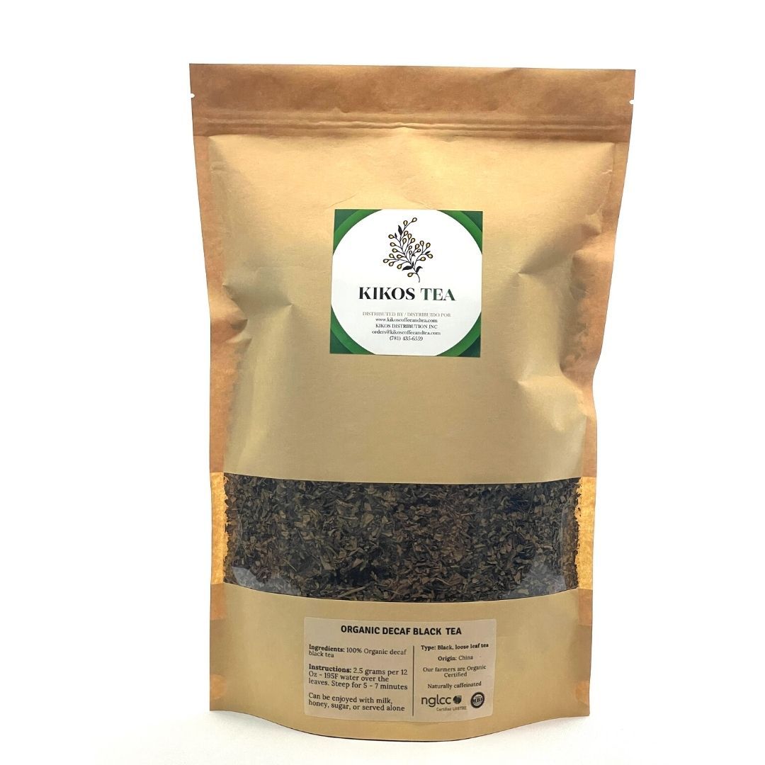 A package of Organic Decaf Black Tea featuring loose leaf tea leaves, ideal for brewing a soothing cup without caffeine.