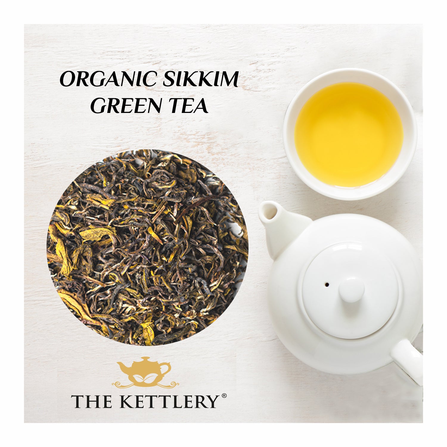 A cup of Organic Sikkim Green Tea surrounded by fresh green tea leaves, showcasing its light color and delicate aroma.