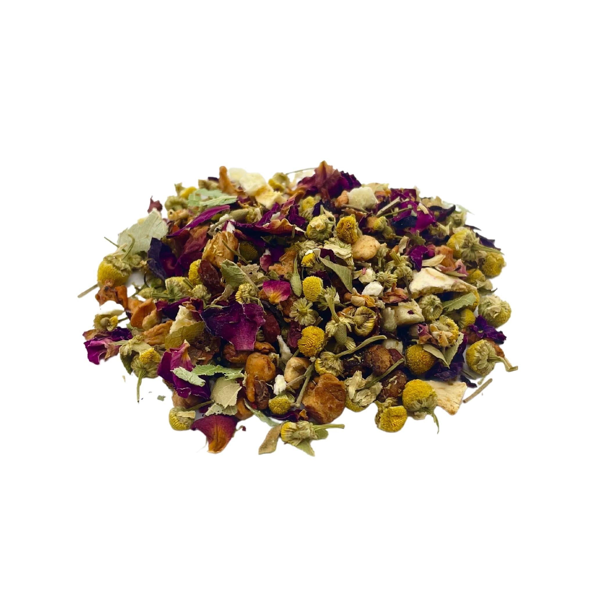 A vibrant display of Peachy Chamomile loose leaf tea featuring chamomile flowers, peach pieces, and rose petals in a clear glass container.