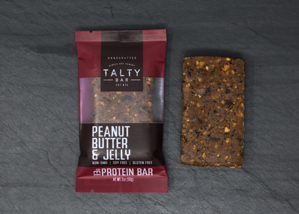 Peanut Butter & Jelly Box energy bar with wholesome ingredients like roasted peanuts and cherries, perfect for on-the-go snacking.