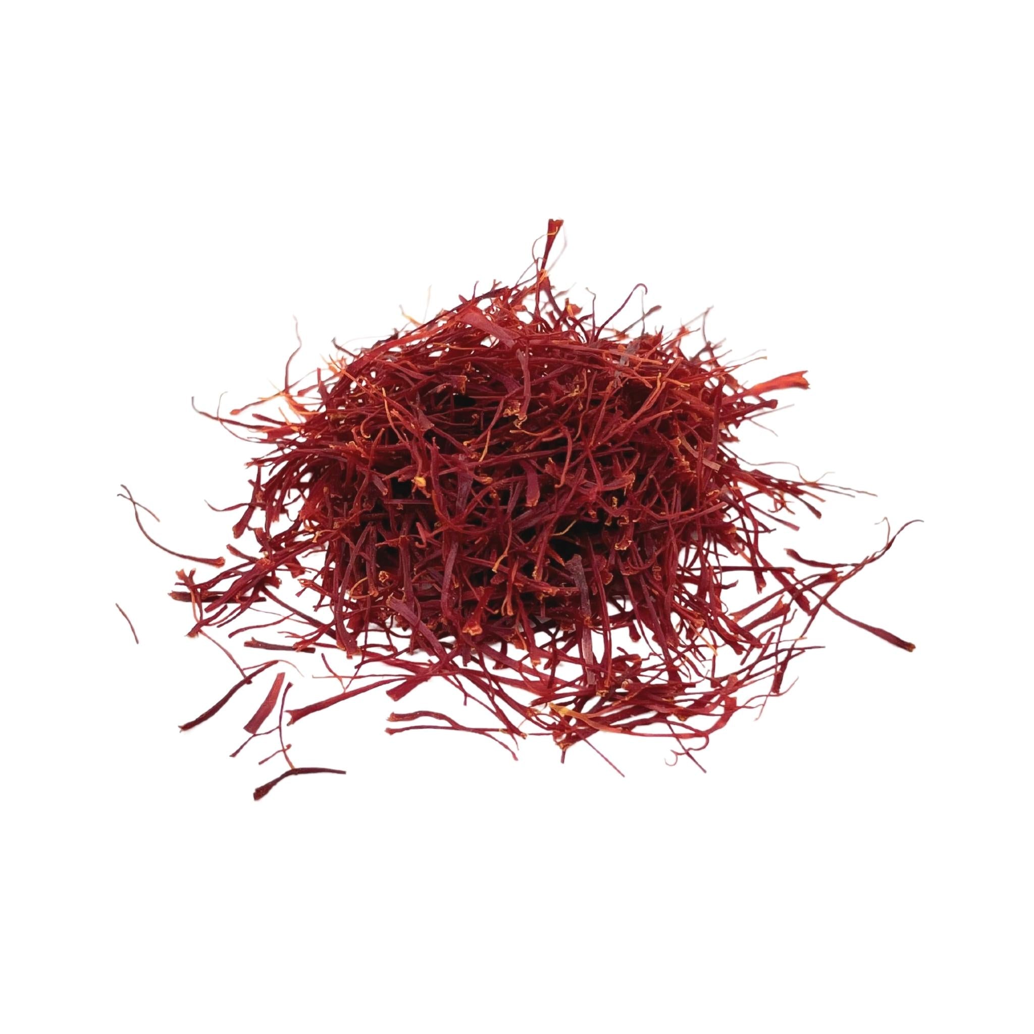 Premium Afghan Saffron threads in a small glass jar, showcasing their vibrant red color and delicate texture.