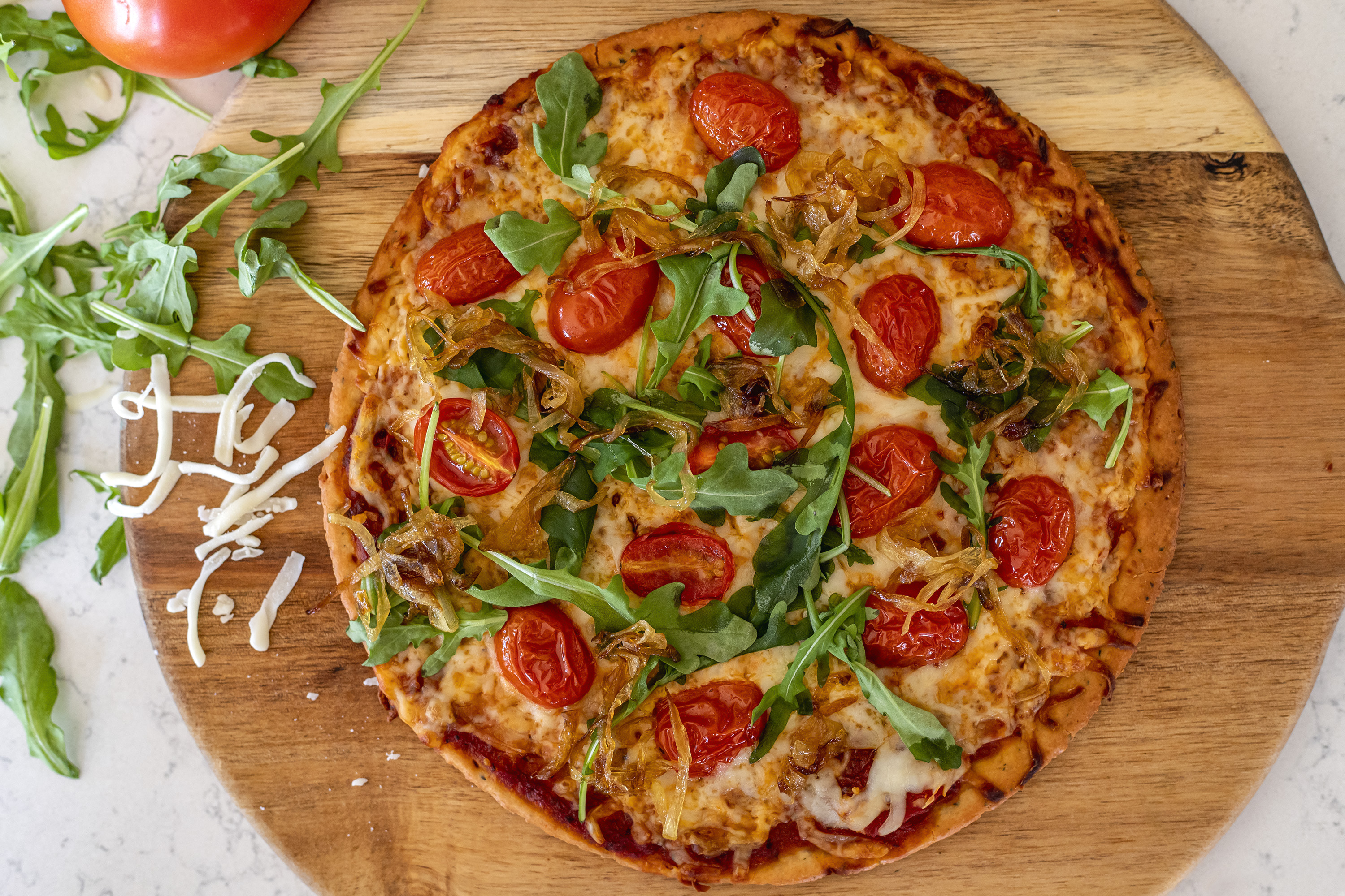 Premium Keto Pizza Crust made from all-natural ingredients, gluten-free and keto-friendly, available in 9" and 12" sizes.