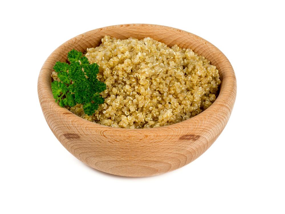 A jar of Quinoa & Brown Basmati Whole Grain Mix showcasing the grains and packaging, emphasizing its natural and healthy ingredients.