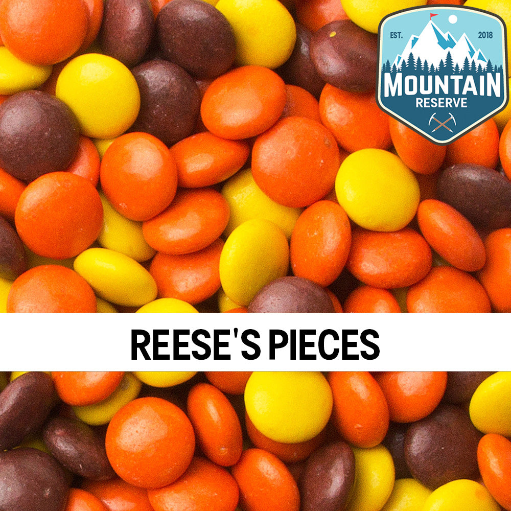 A 6oz container of Reese's Pieces candy showcasing colorful candy-coated peanut butter treats.