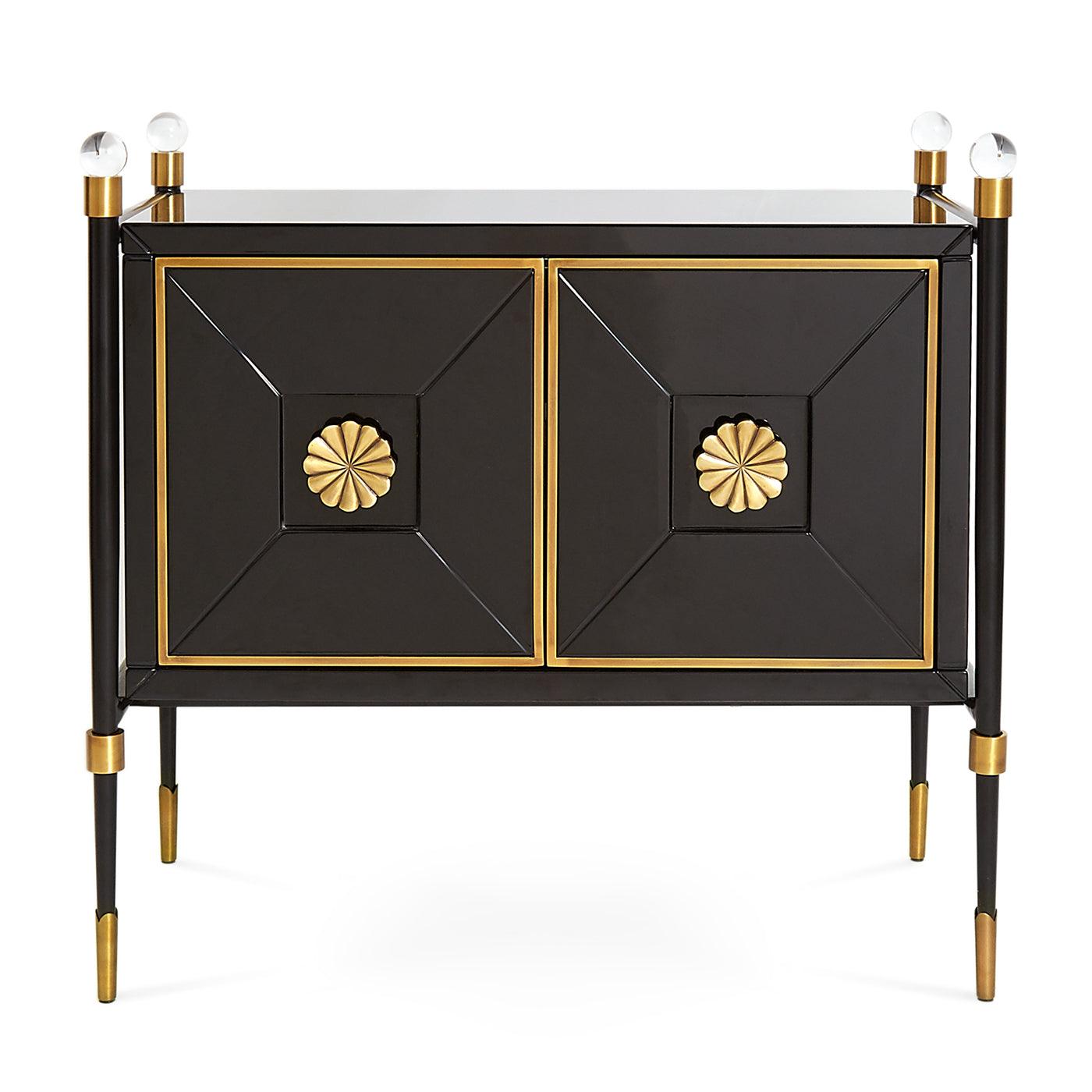 Rider Small Cabinet by Jonathan Adler featuring glossy black lacquer, antiqued brass accents, and acrylic finials, showcasing modern elegance.