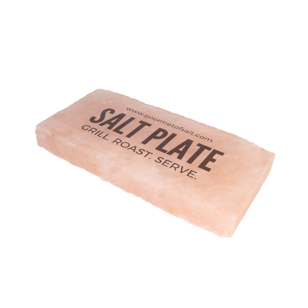 A small SALT PLATE made of Himalayan pink salt, perfect for grilling and serving various dishes, showcasing its unique natural patterns.