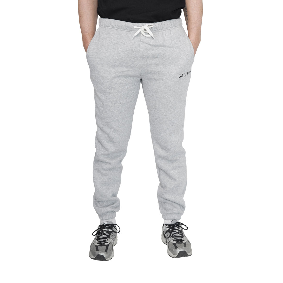 SALTVERK Grey Sweatpants featuring an embroidered logo, made from 100% cotton, showcasing a stylish and comfortable design.