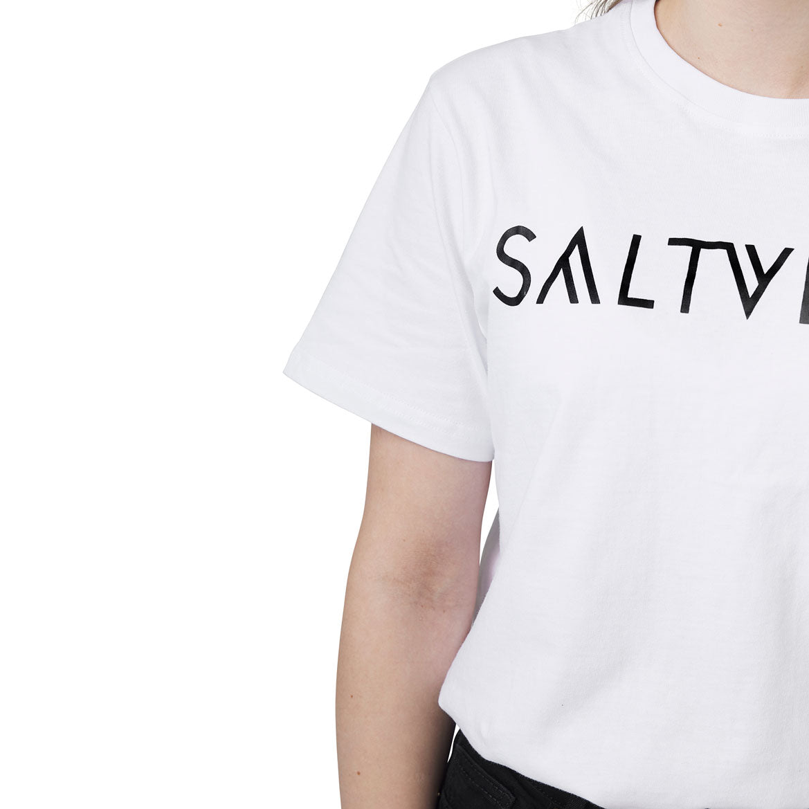 SALTVERK White UNISEX T-Shirt displayed on a hanger, showcasing its soft cotton fabric and stylish design.