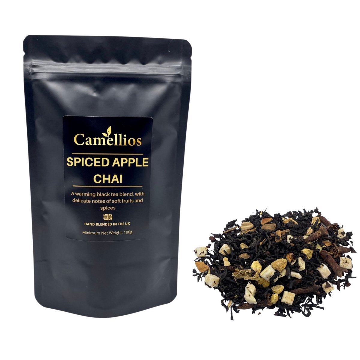 A vibrant display of Spiced Apple Chai loose leaf tea with spices and dried apple pieces, showcasing its rich colors and textures.