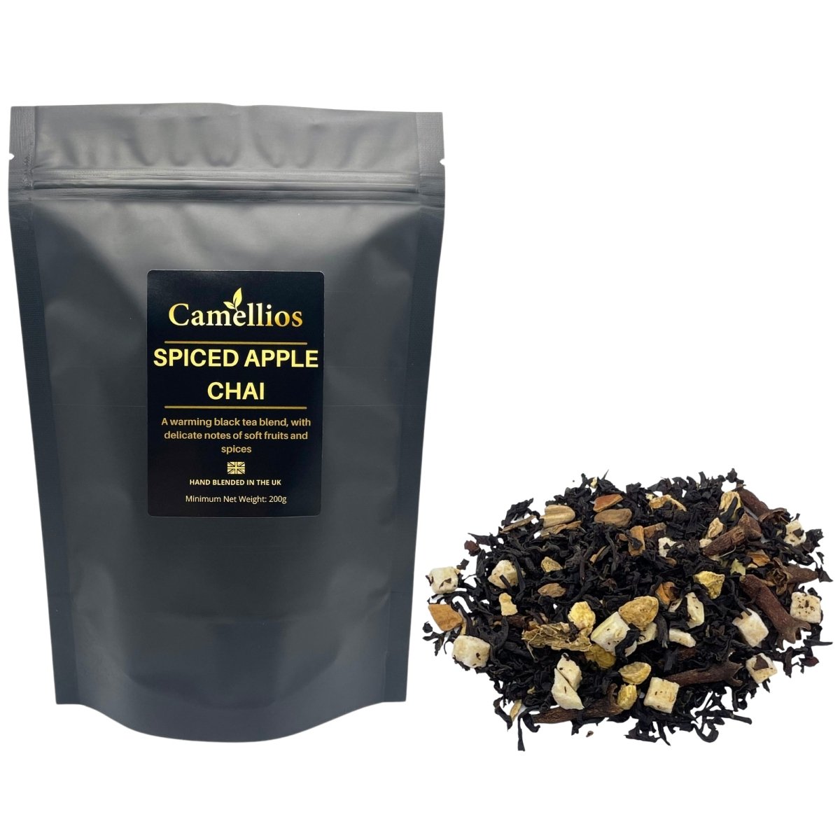 A vibrant display of Spiced Apple Chai loose leaf tea with spices and dried apple pieces, showcasing its rich colors and textures.