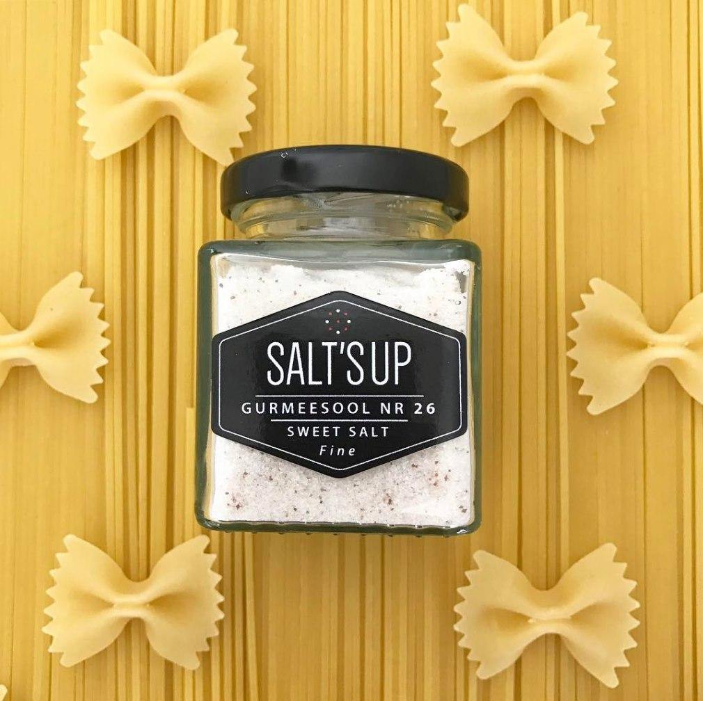 SWEET SALT fine ecopack showcasing its mineral-rich salt in eco-friendly packaging, ideal for enhancing flavors in various dishes.