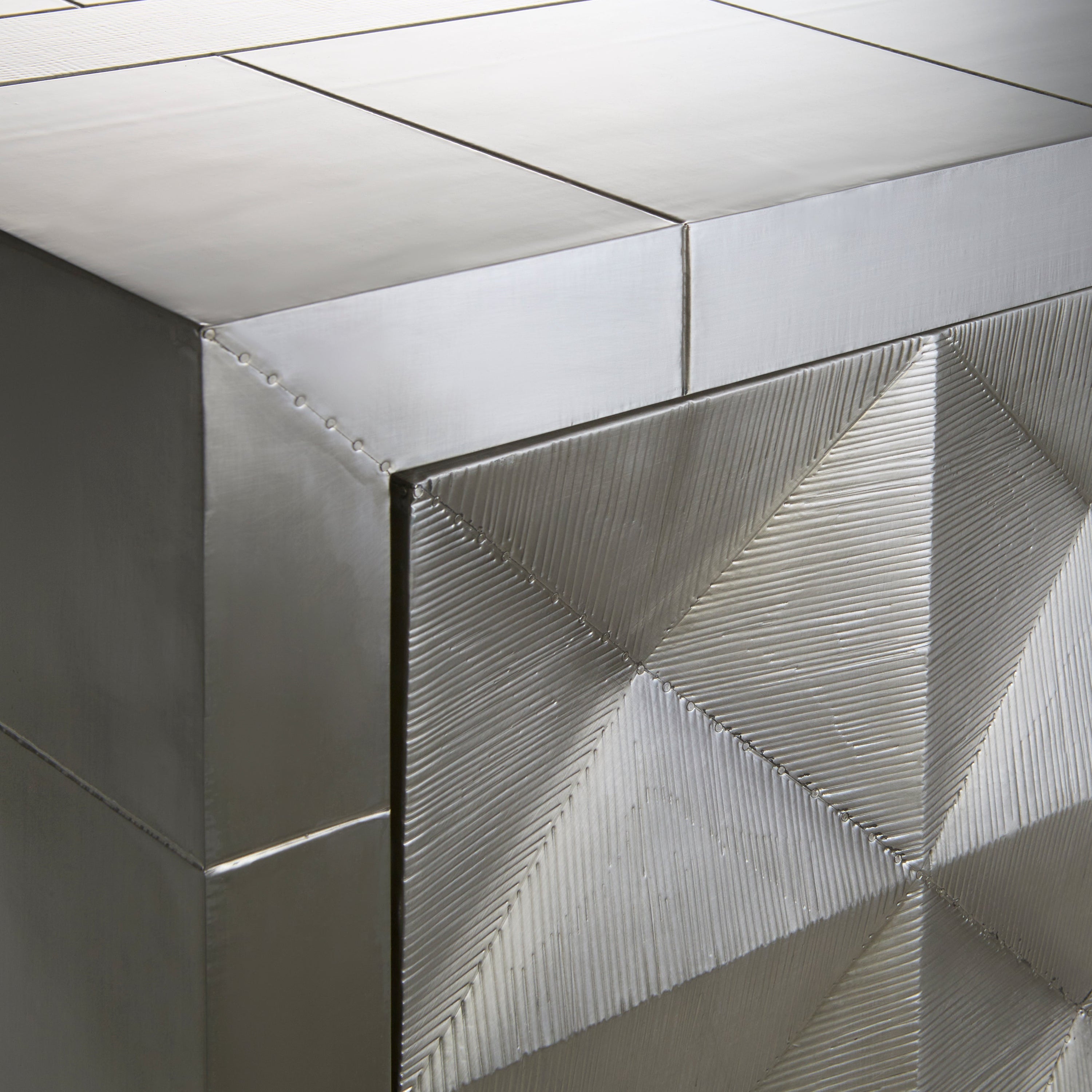 Talitha Two-Door Console in nickel-plated metal with geometric patterns, featuring two drawers and adjustable shelves.