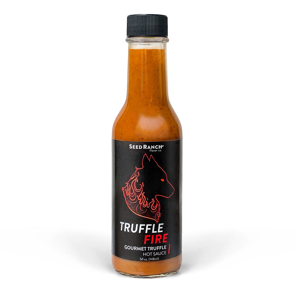 The Truffle Sauce Bundle featuring gourmet hot sauce with summer truffles and peppers in a stylish bottle.