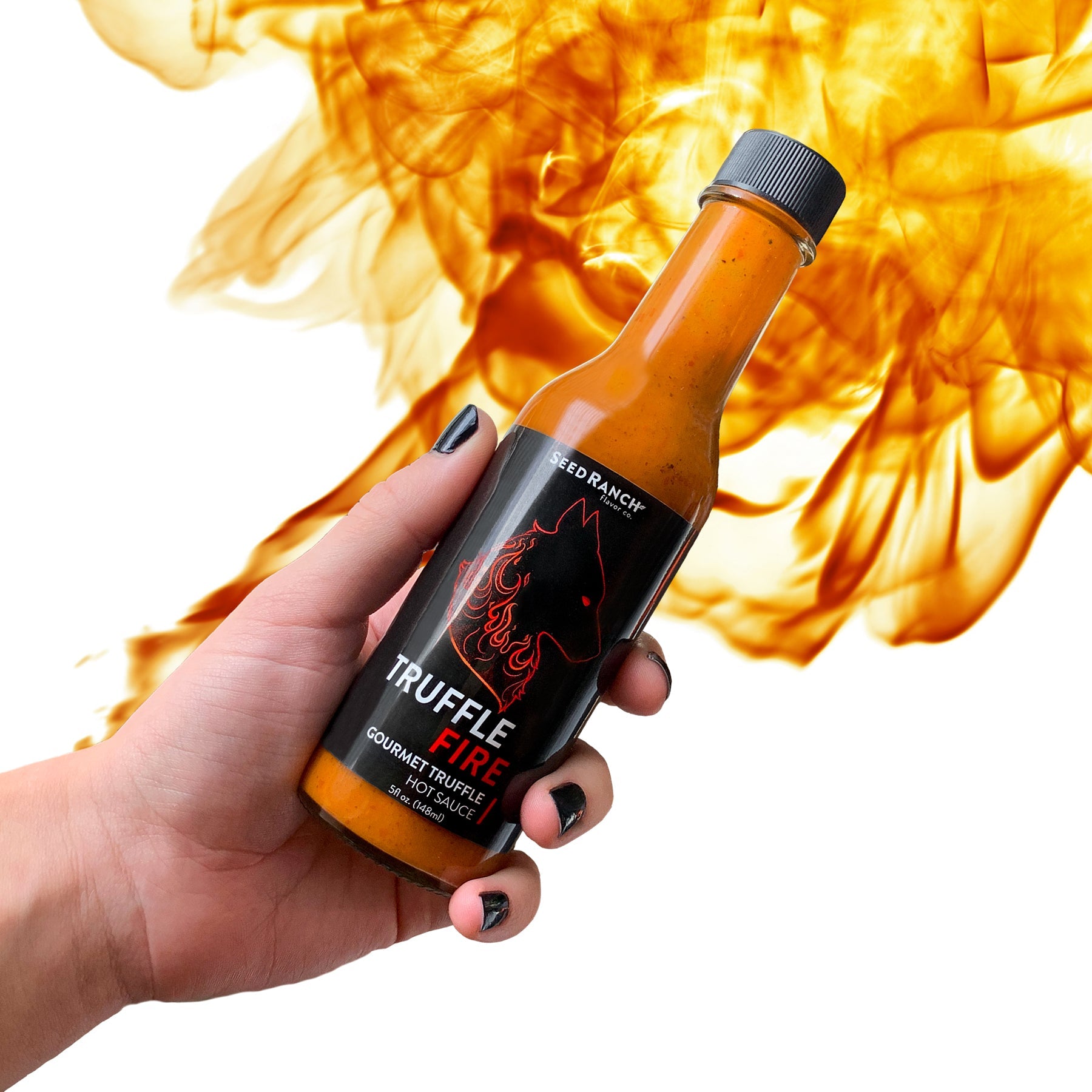 The Truffle Sauce Bundle featuring gourmet hot sauce with summer truffles and peppers in a stylish bottle.