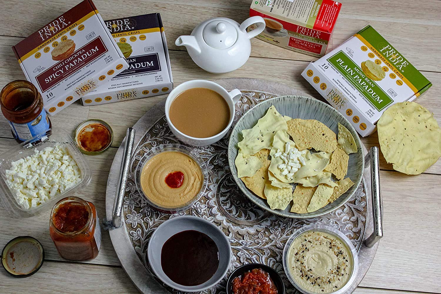 A pack of Tikka Curry Mung Bean Papadum, showcasing the lentil crisps with vibrant colors and textures, ideal for snacking or appetizers.