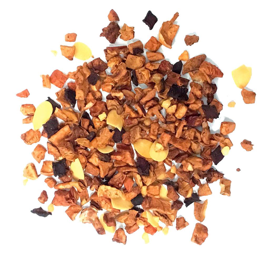 A vibrant package of Tisane Almond Elixir Tea featuring a blend of almonds, apple, and cinnamon, showcasing its fruity and aromatic qualities.