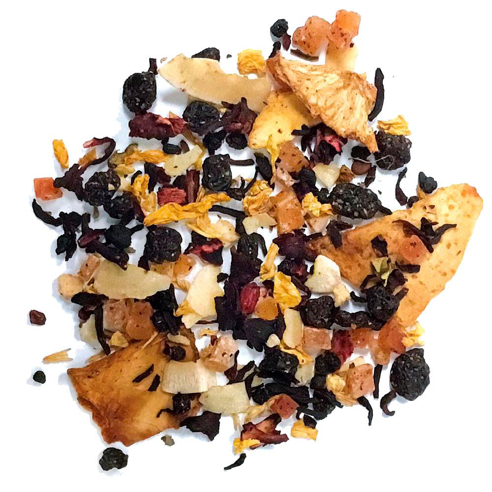 A vibrant package of Tisane Tropical Mango Tea featuring tropical fruits like mango, papaya, and coconut, with loose-leaf tea visible.