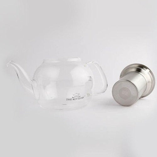 Victoria Tea Kettle made of borosilicate glass with a stainless steel infuser, featuring an elegant curvy design.