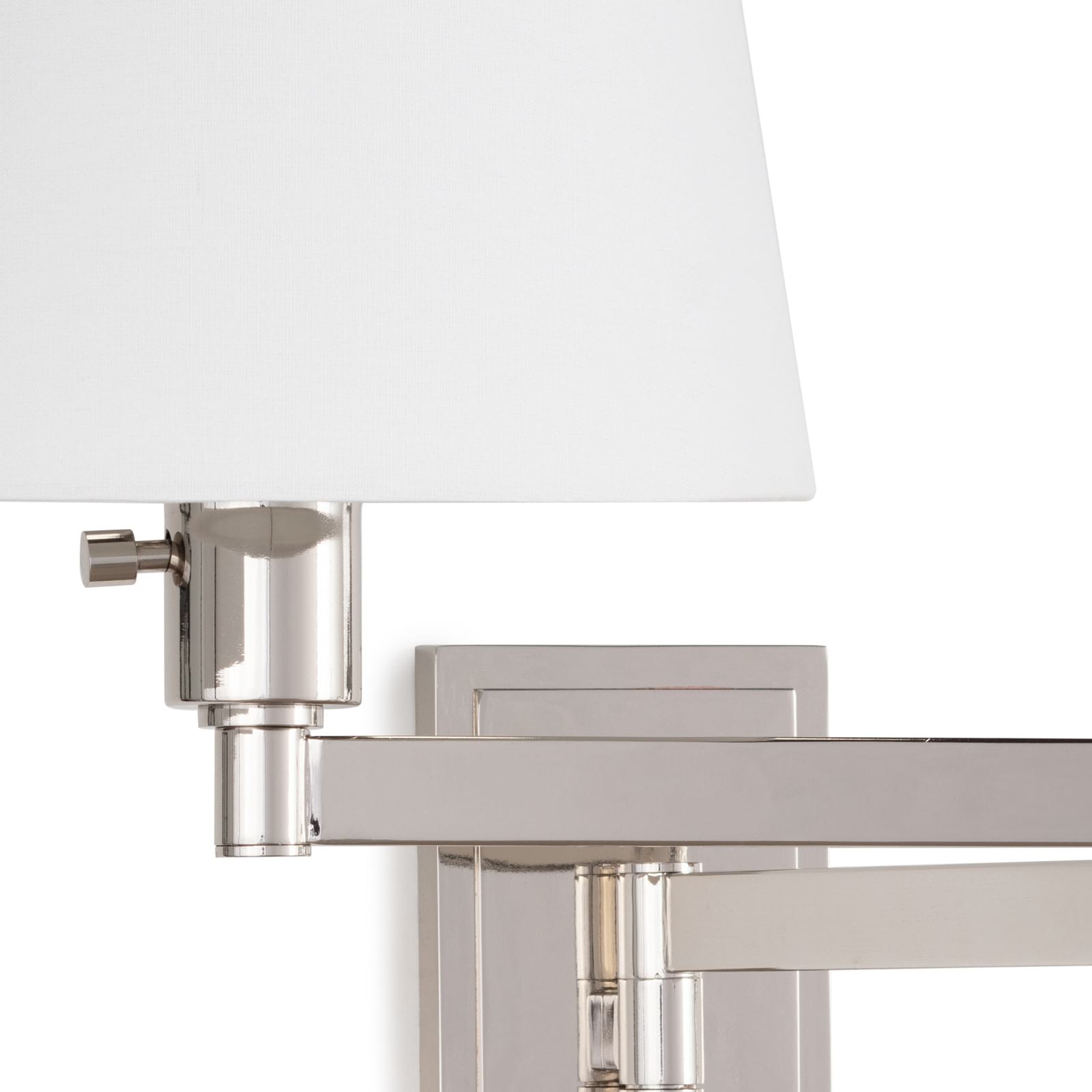 Virtue Sconce in Polished Nickel showcasing its elegant design and adjustable arm for task lighting.