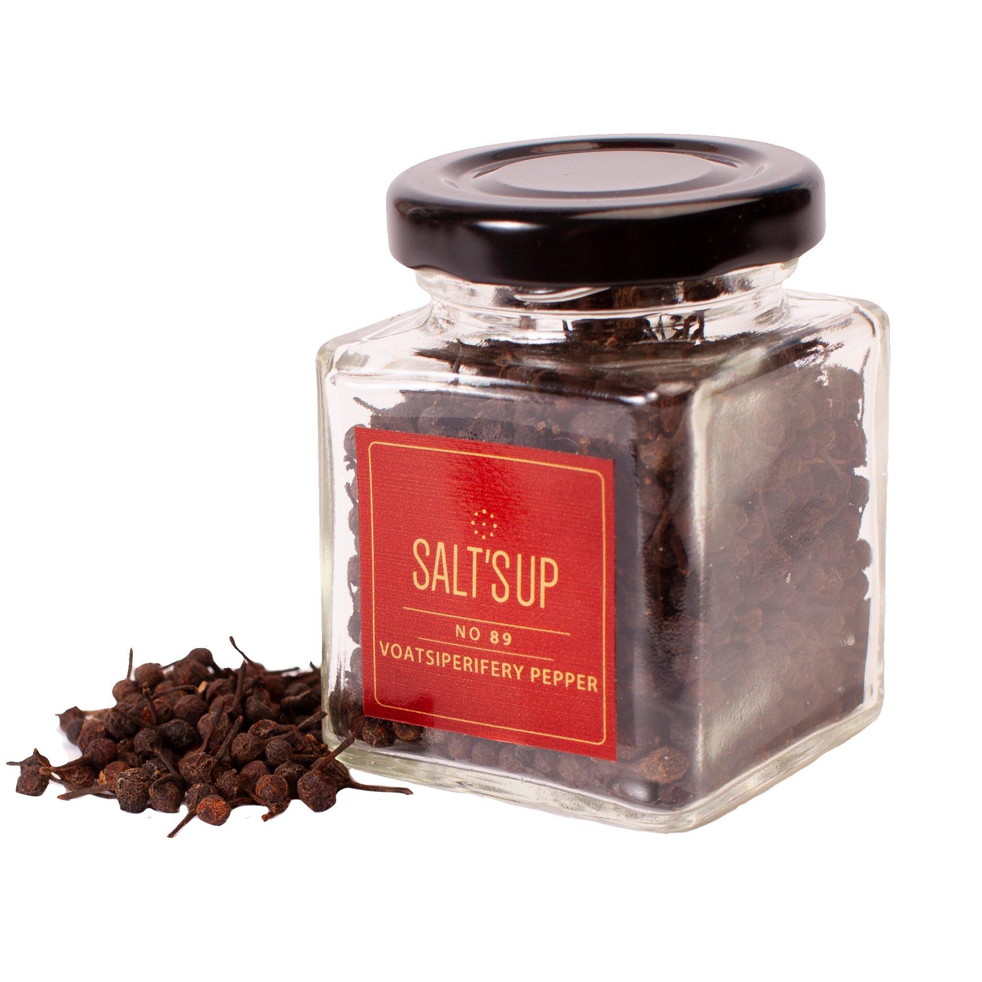 A glass jar of VOATSIPERIFERY pepper showcasing its unique wild cubeb from Madagascar, with a rich aroma and distinctive flavor.