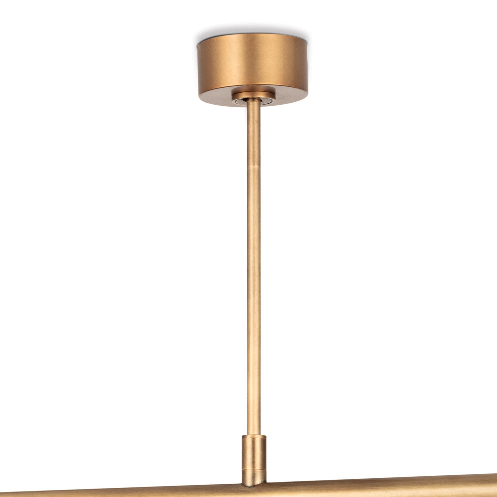 Wick Chandelier in Natural Brass with frosted glass bulb covers, featuring four swivel arms and a modern design.