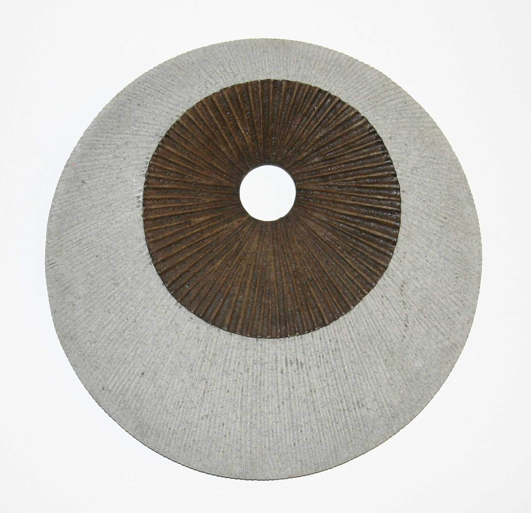 Brown and gray round ribbed wall decor featuring a spiral design, made of sandstone, perfect for modern home aesthetics.