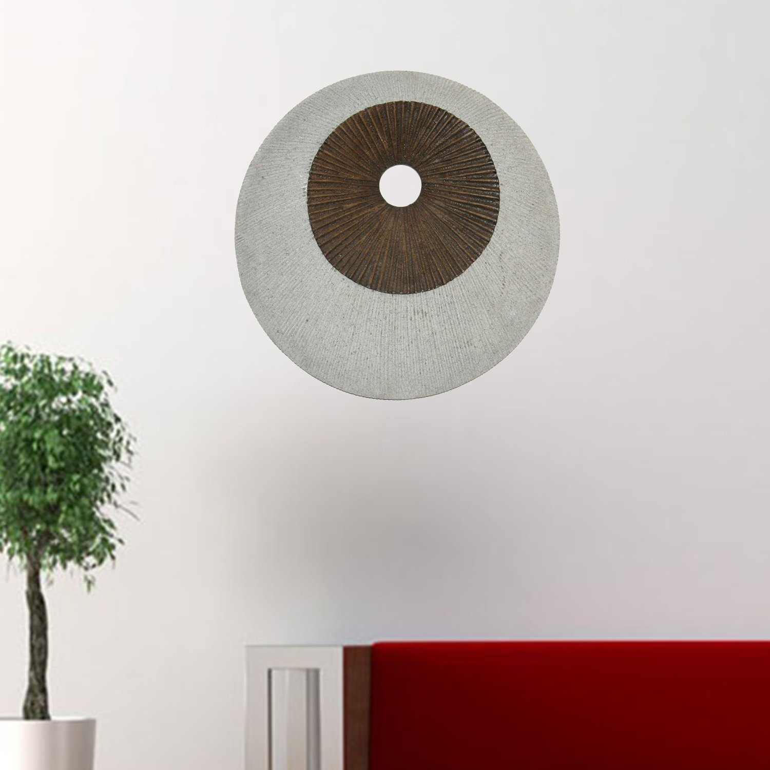 Brown and gray round ribbed wall decor featuring a spiral design, made of sandstone, perfect for modern home aesthetics.