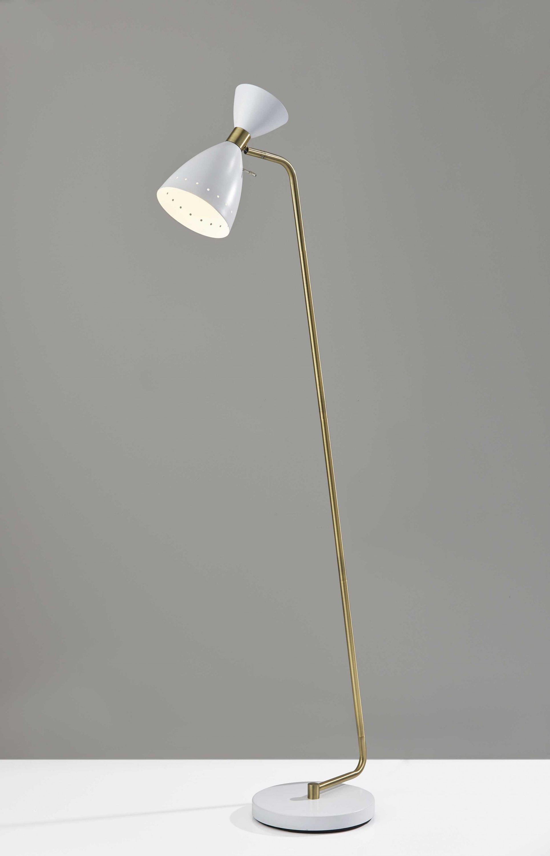 A stylish 10" x 20.5" x 59" white metal floor lamp with an adjustable oversized shade and antique brass accents, perfect for mid-century decor.