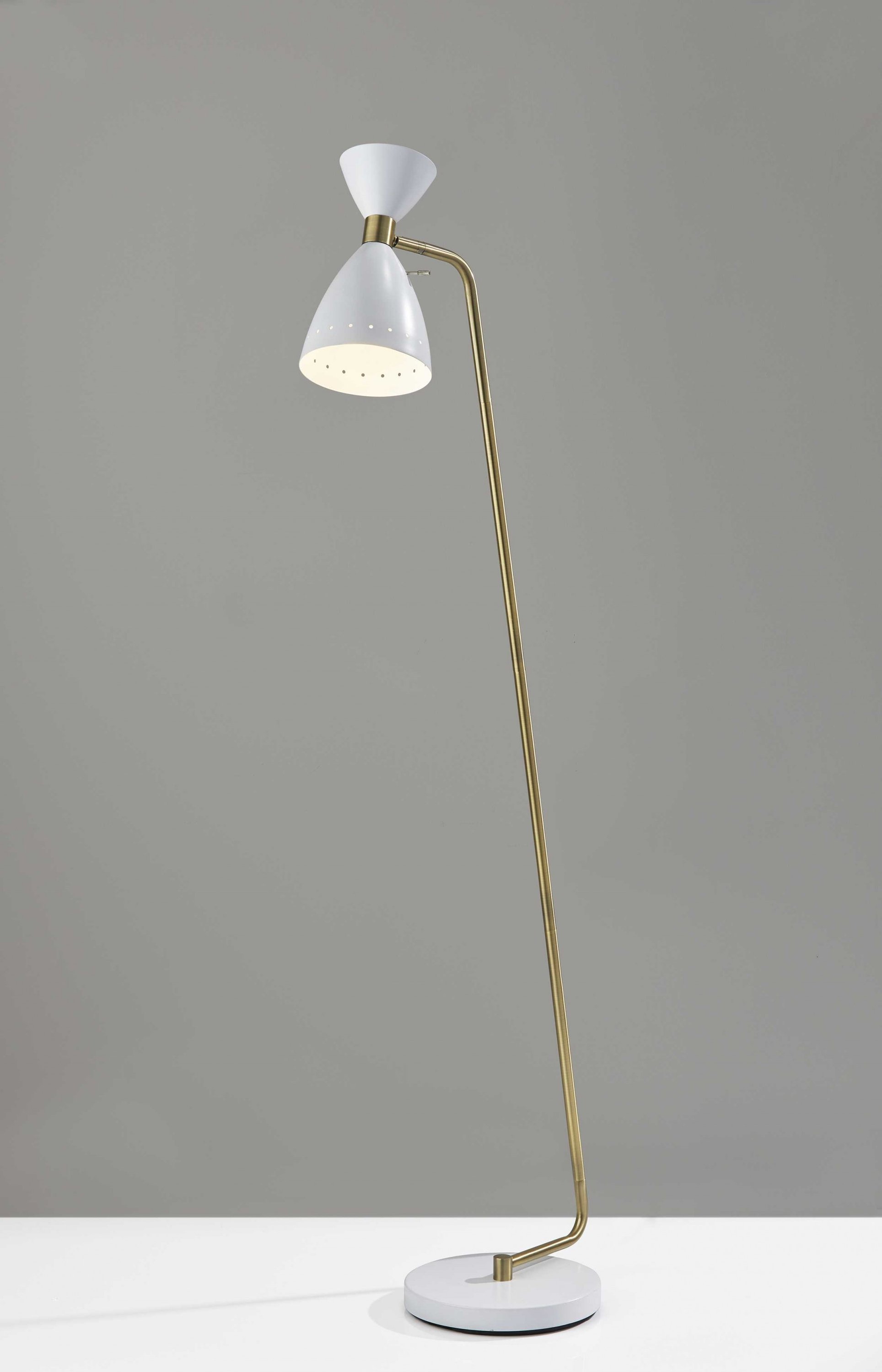 A stylish 10" x 20.5" x 59" white metal floor lamp with an adjustable oversized shade and antique brass accents, perfect for mid-century decor.