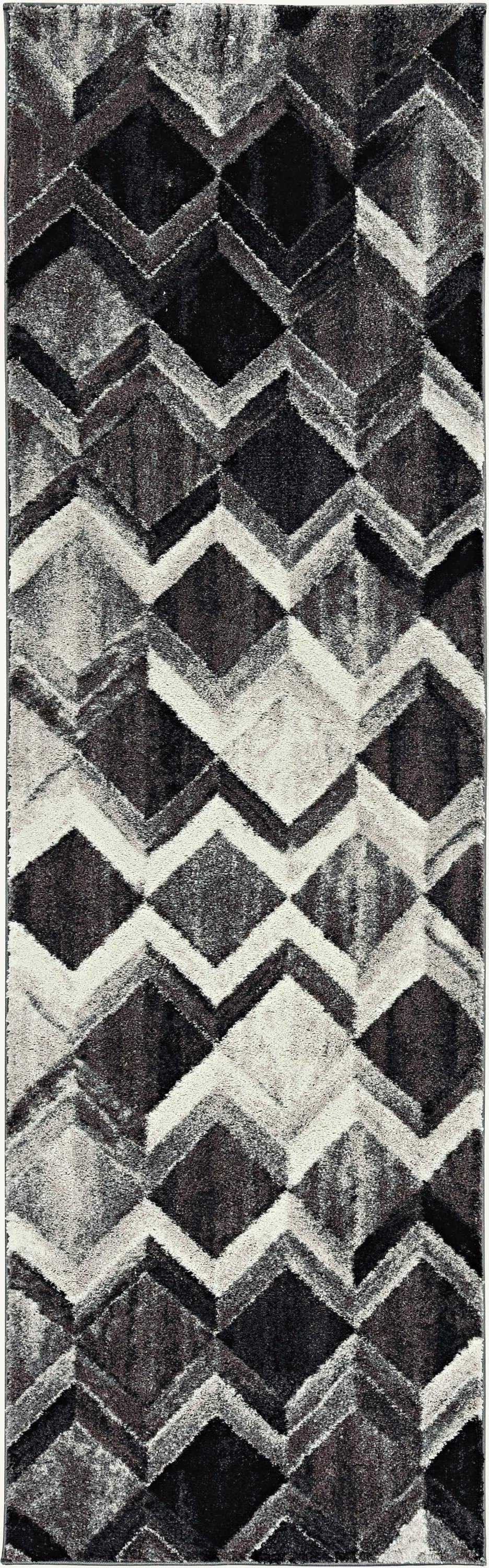 A large 105" x 156" grey and mocha polyester rug featuring a unique herringbone pattern, showcasing plush fibers and elegant design.