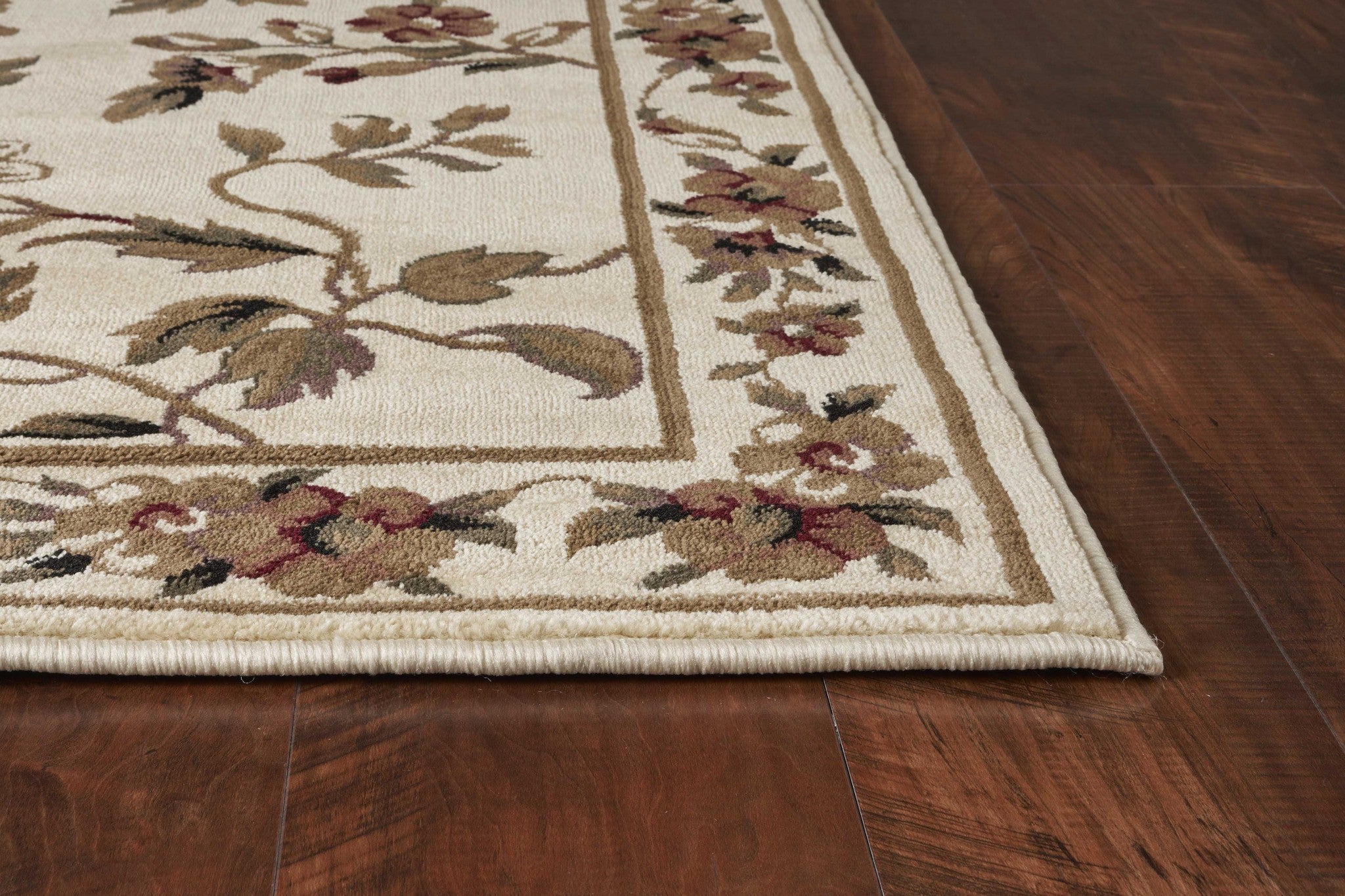 Ivory machine woven floral vines indoor area rug, showcasing intricate floral patterns on a soft ivory background, perfect for enhancing home decor.