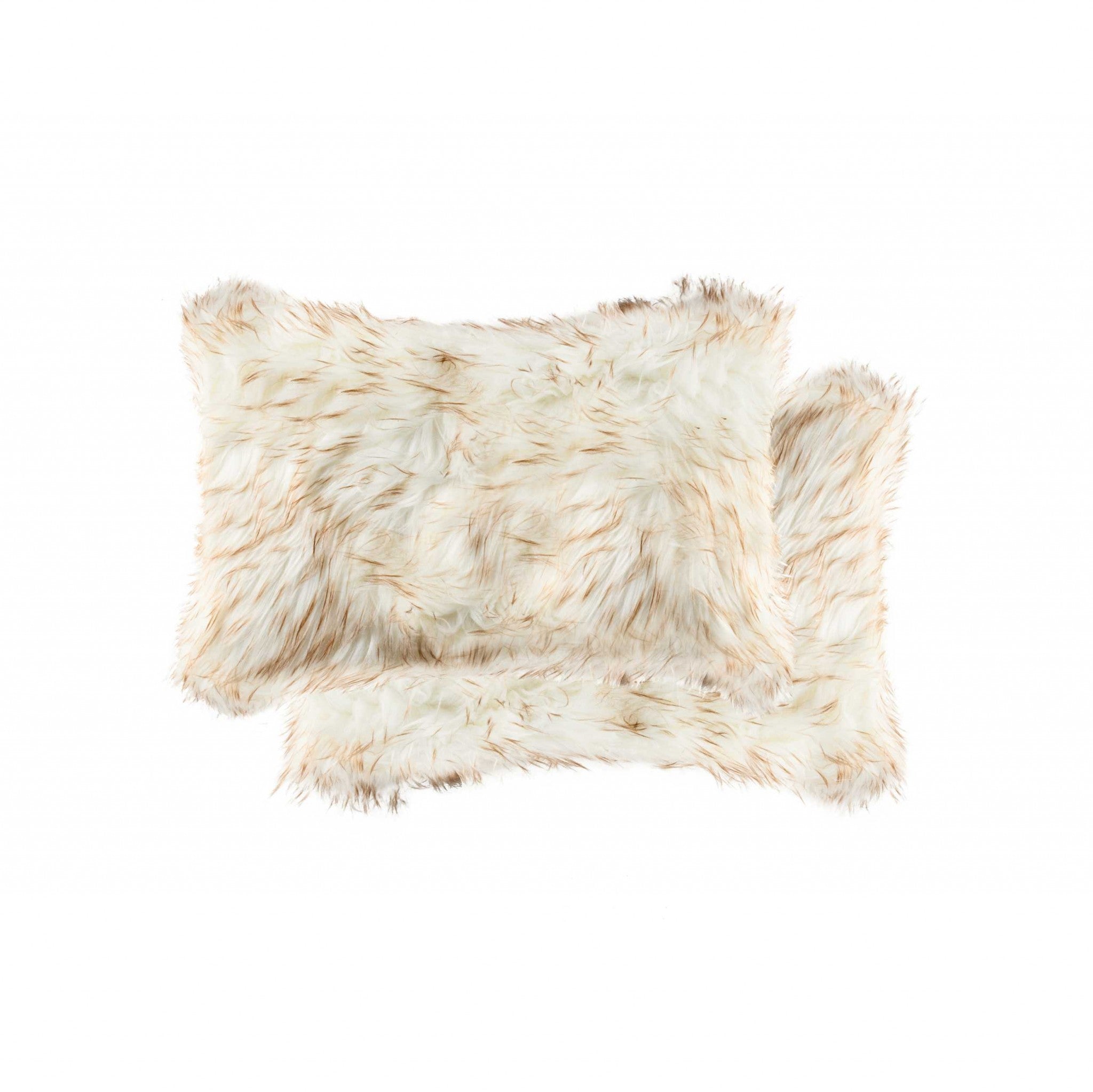 Two luxurious gradient tan faux fur pillows, measuring 12x20 inches, showcasing a plush texture and elegant design, perfect for home decor.