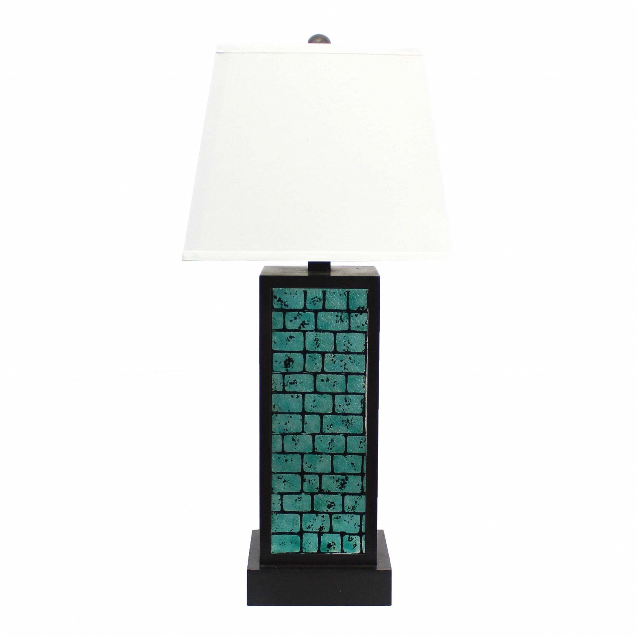 A contemporary teal brick pattern table lamp with a white linen shade, showcasing a stylish metal base.