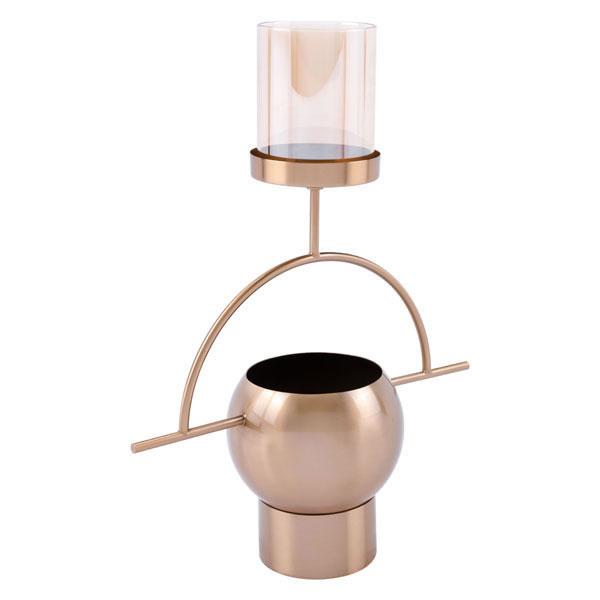 Antique brass candle holder with tinted glass cylinder, elegantly designed for home decor.