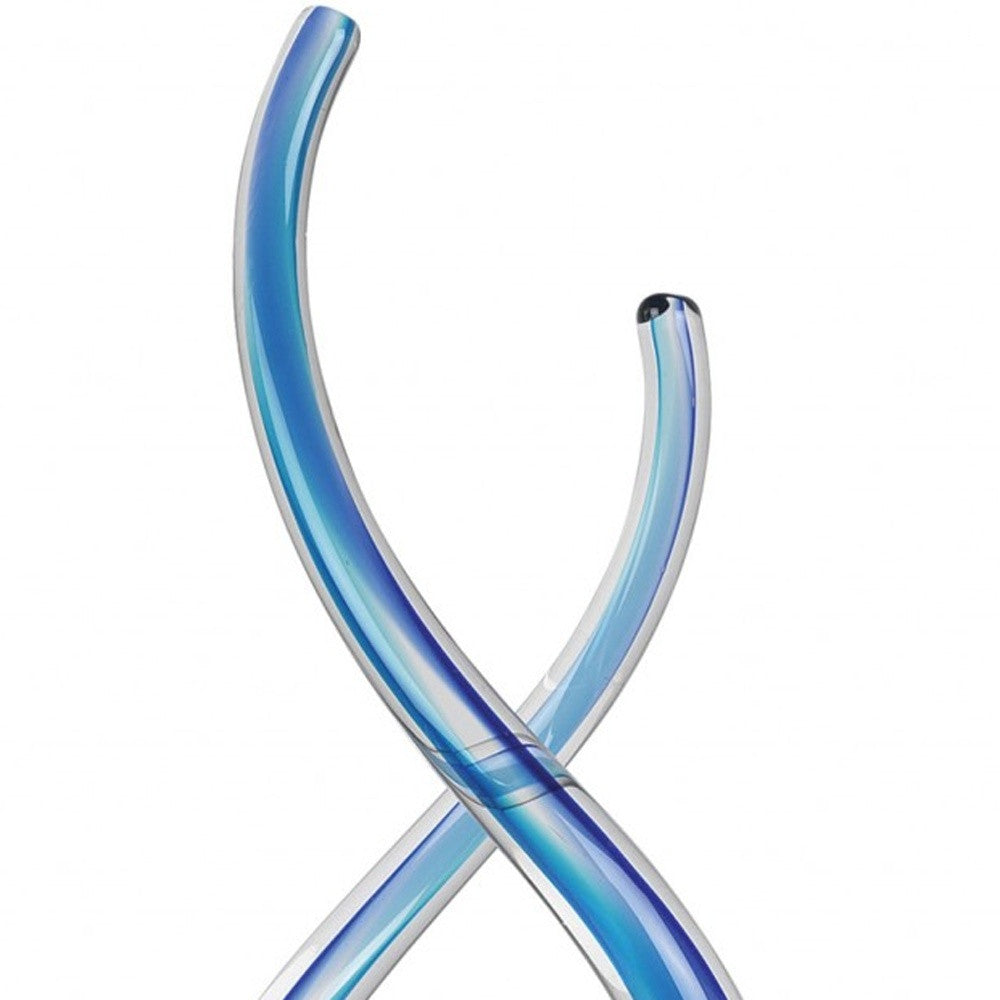 14-inch contemporary blue art glass centerpiece with twisting design on a clear crystal base, showcasing vibrant blue hues.