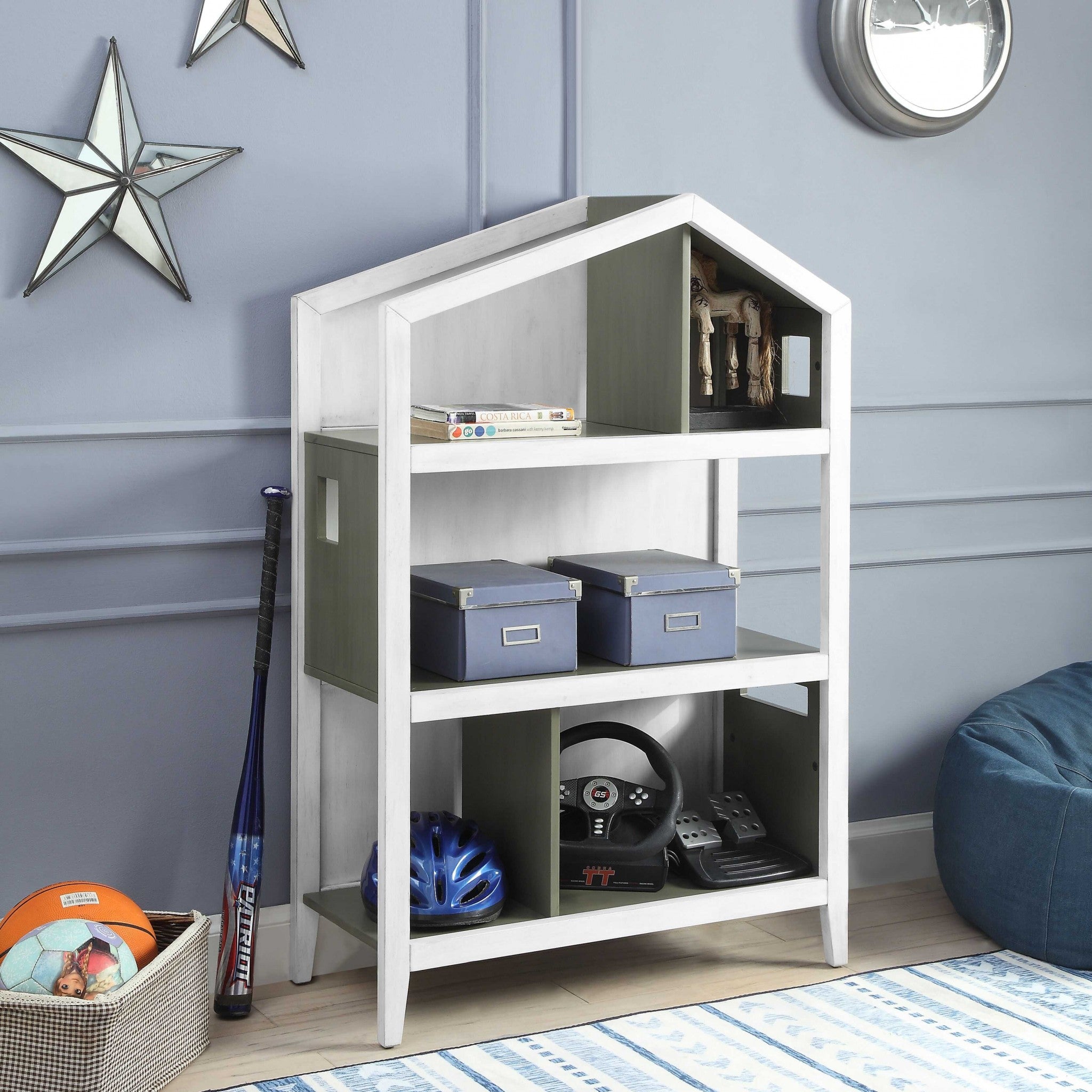 Elegant white and pink wood bookcase in castle shape, perfect for children's room storage.