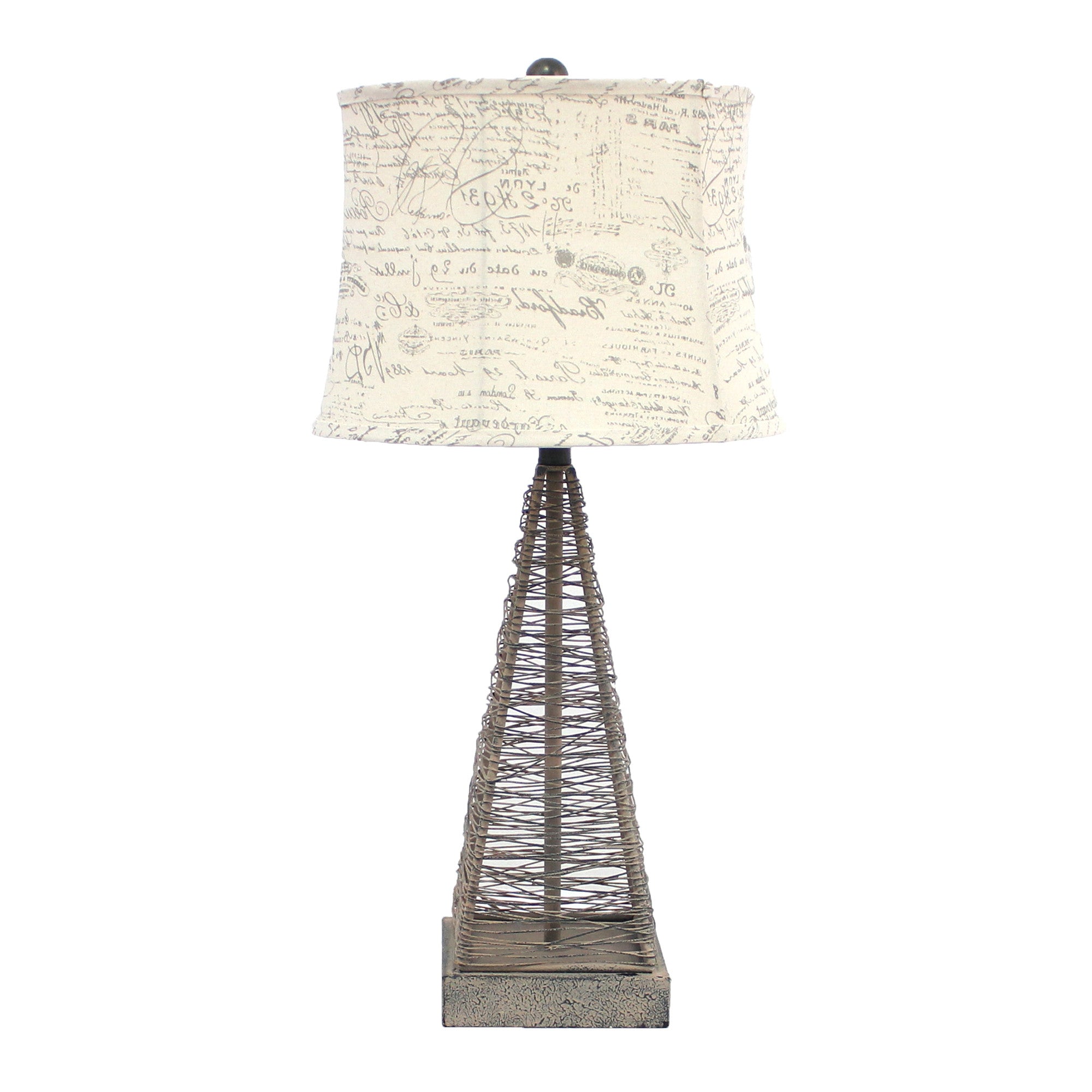 Tan industrial metal table lamp with a cone wire mesh base and round white linen shade, perfect for home decor.