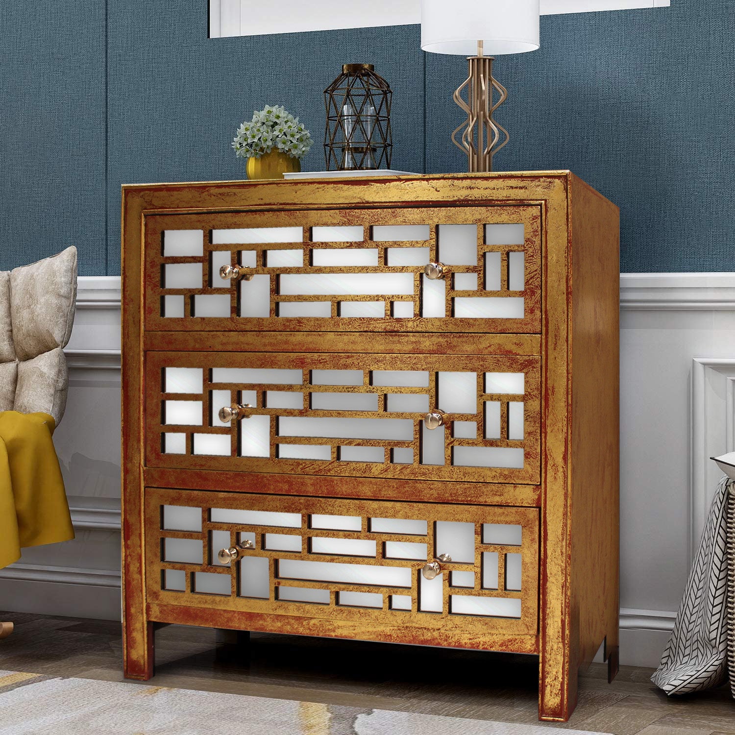 15 x 32 x 32 vintage wooden cabinet with three drawers, featuring a distressed gold and red finish and pearl-like drawer knobs.