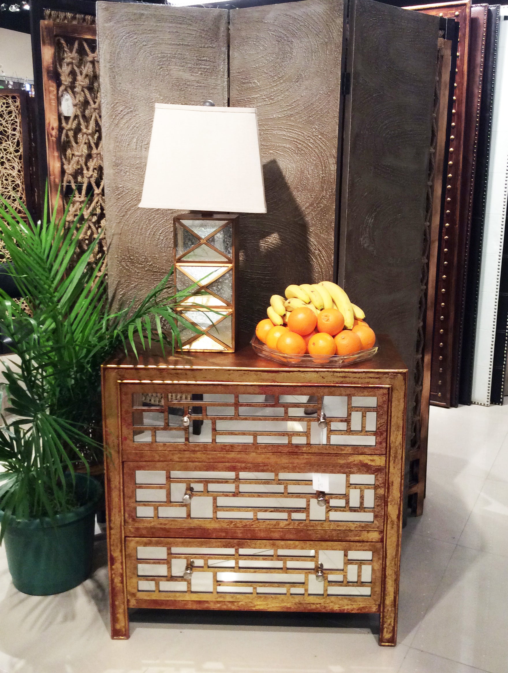 15 x 32 x 32 vintage wooden cabinet with three drawers, featuring a distressed gold and red finish and pearl-like drawer knobs.