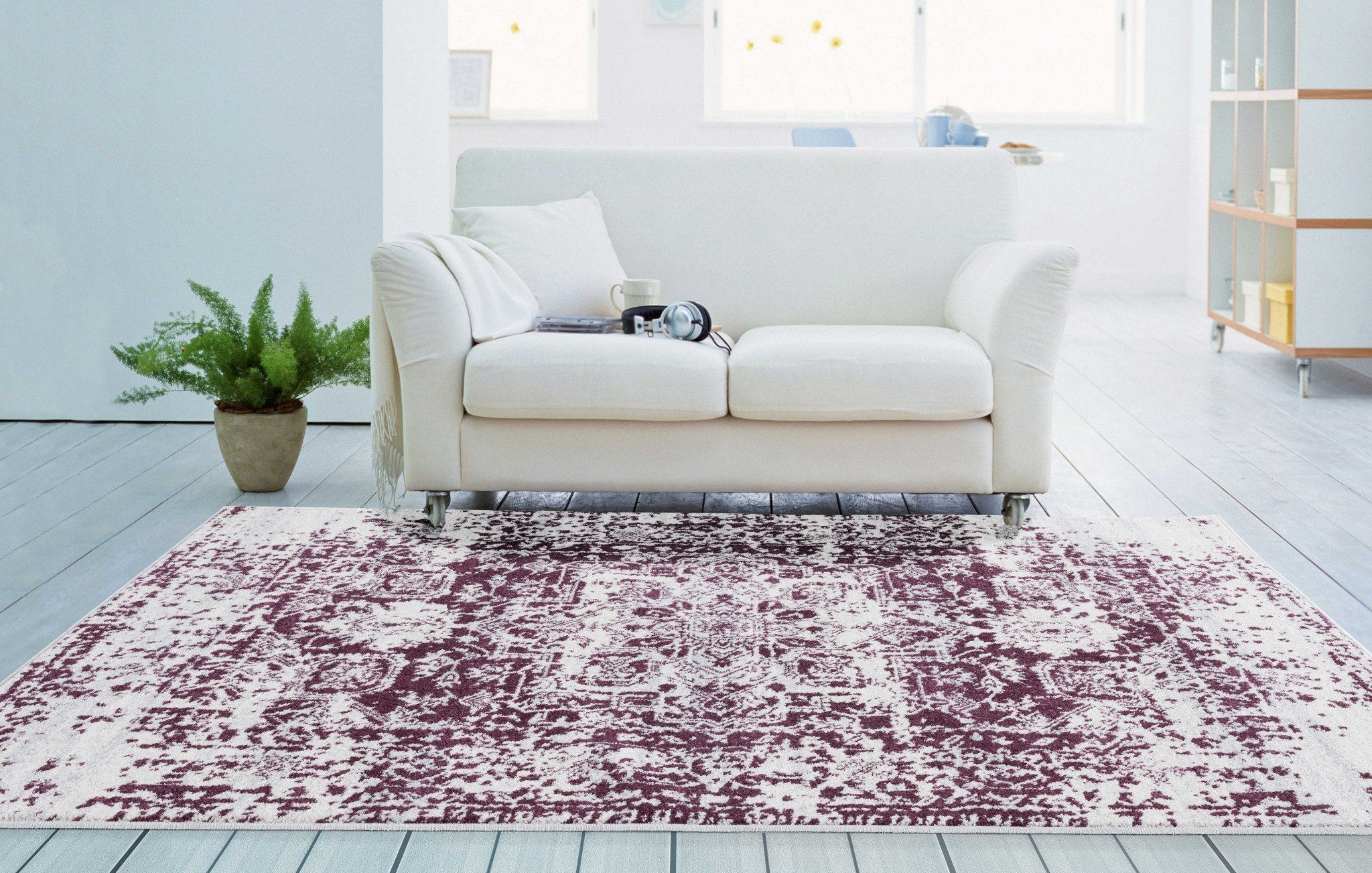 A large 116" x 158" Wine Olefin/Frieze Rug featuring a vintage design in wine plum and ivory colors with a distressed look.