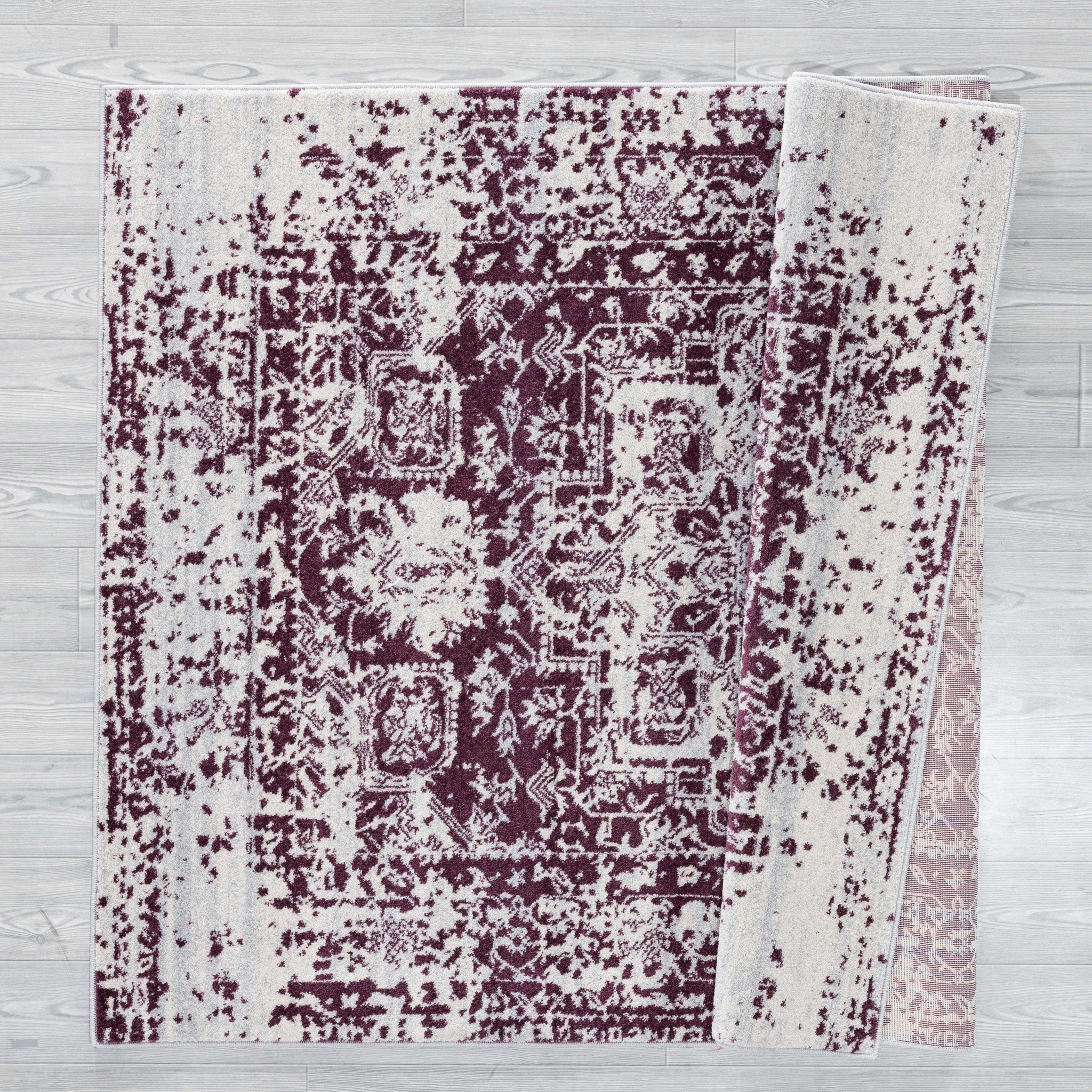 A large 116" x 158" Wine Olefin/Frieze Rug featuring a vintage design in wine plum and ivory colors with a distressed look.