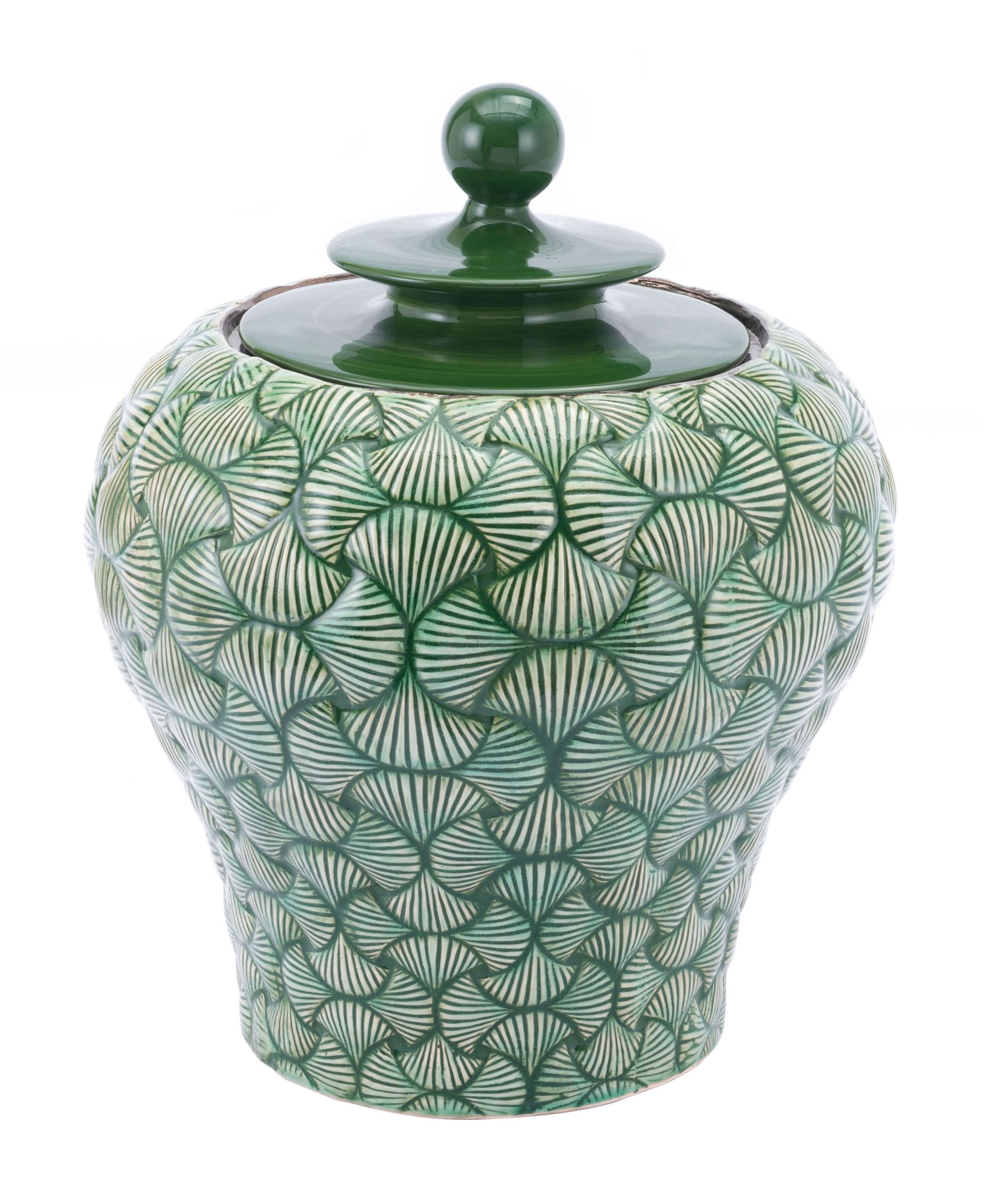 A beautiful green ceramic small temple jar with a textured pattern and architectural finial, perfect for modern home decor.