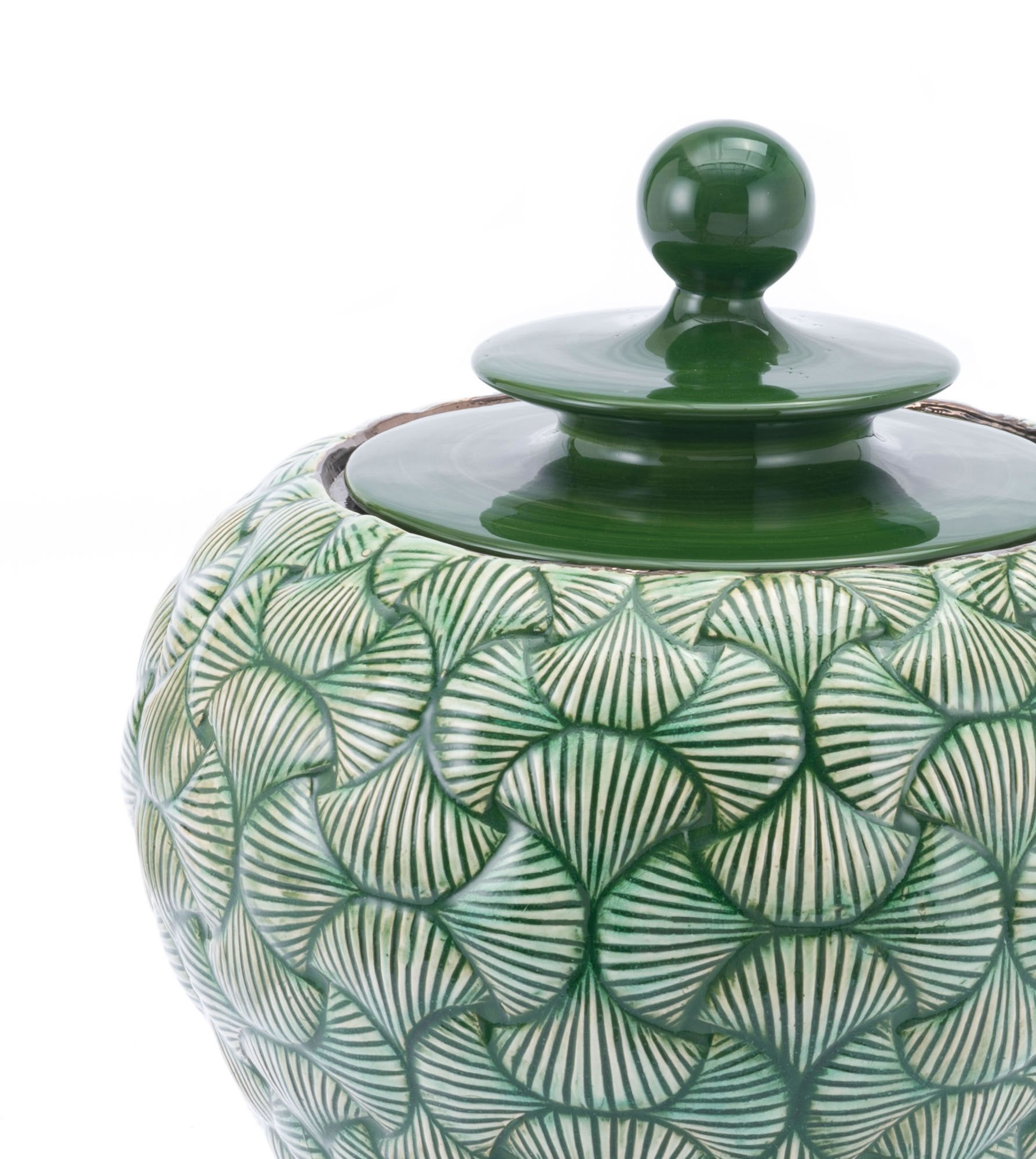 A beautiful green ceramic small temple jar with a textured pattern and architectural finial, perfect for modern home decor.