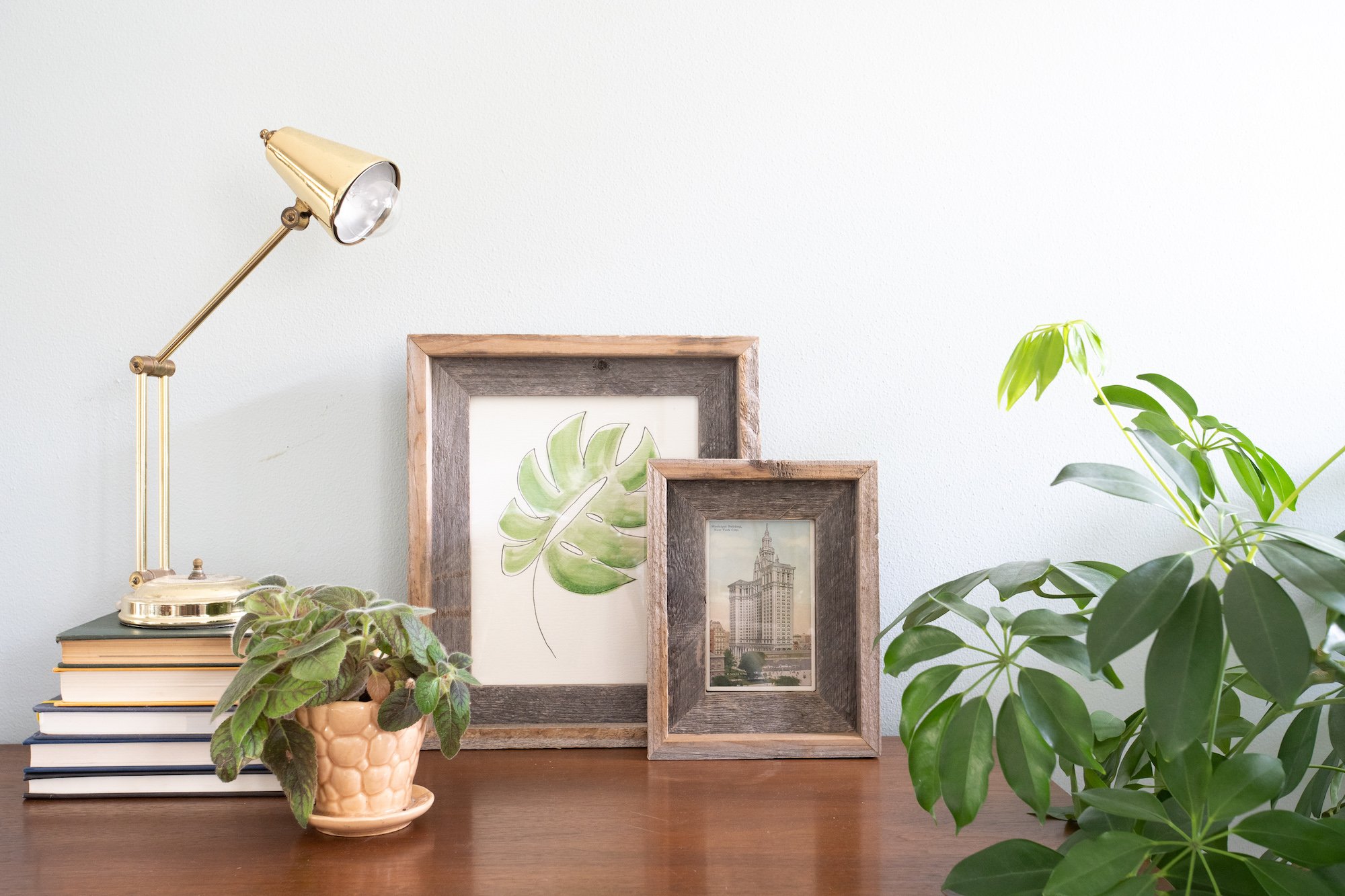 A rustic 16x20 natural weathered grey picture frame made from reclaimed wood, showcasing a beautiful handmade design.