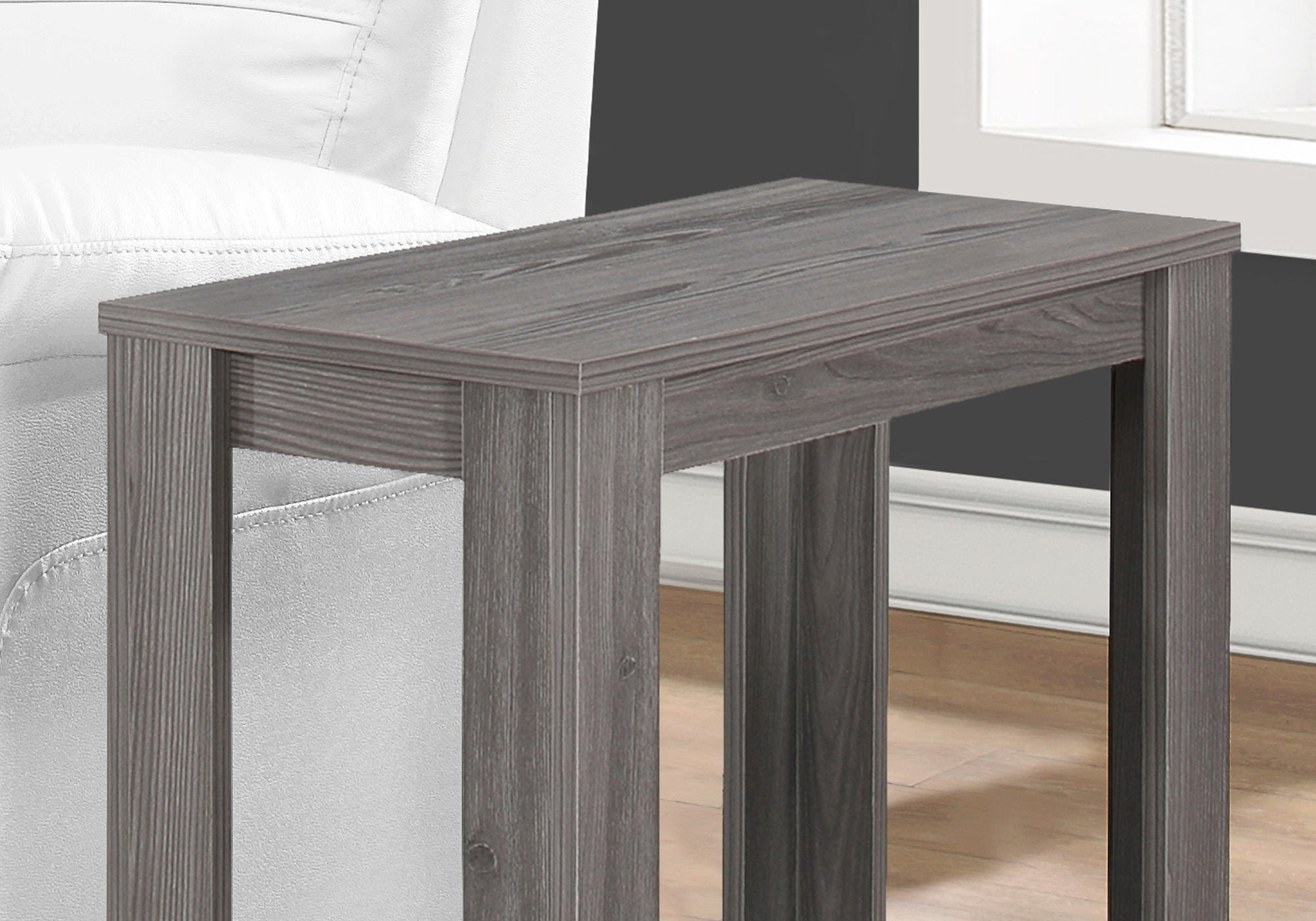 Stylish grey particle board laminate accent table measuring 11.75x23.75x22 inches, perfect for home decor.